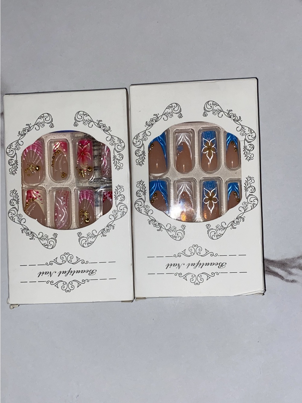 Floral Press-On Nail Sets with Pink and Blue Accents